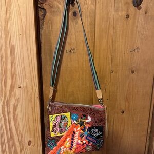 Consuela Red and Orange Crossbody Bag with Artistic Design
